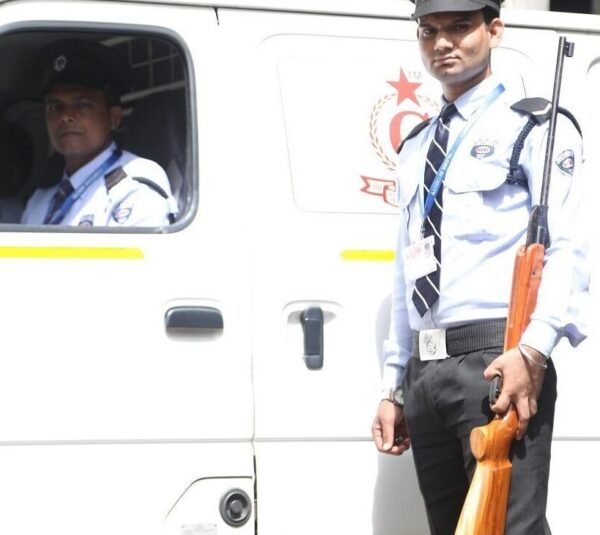 Armed Guard standing with Cash Van in Mumbai