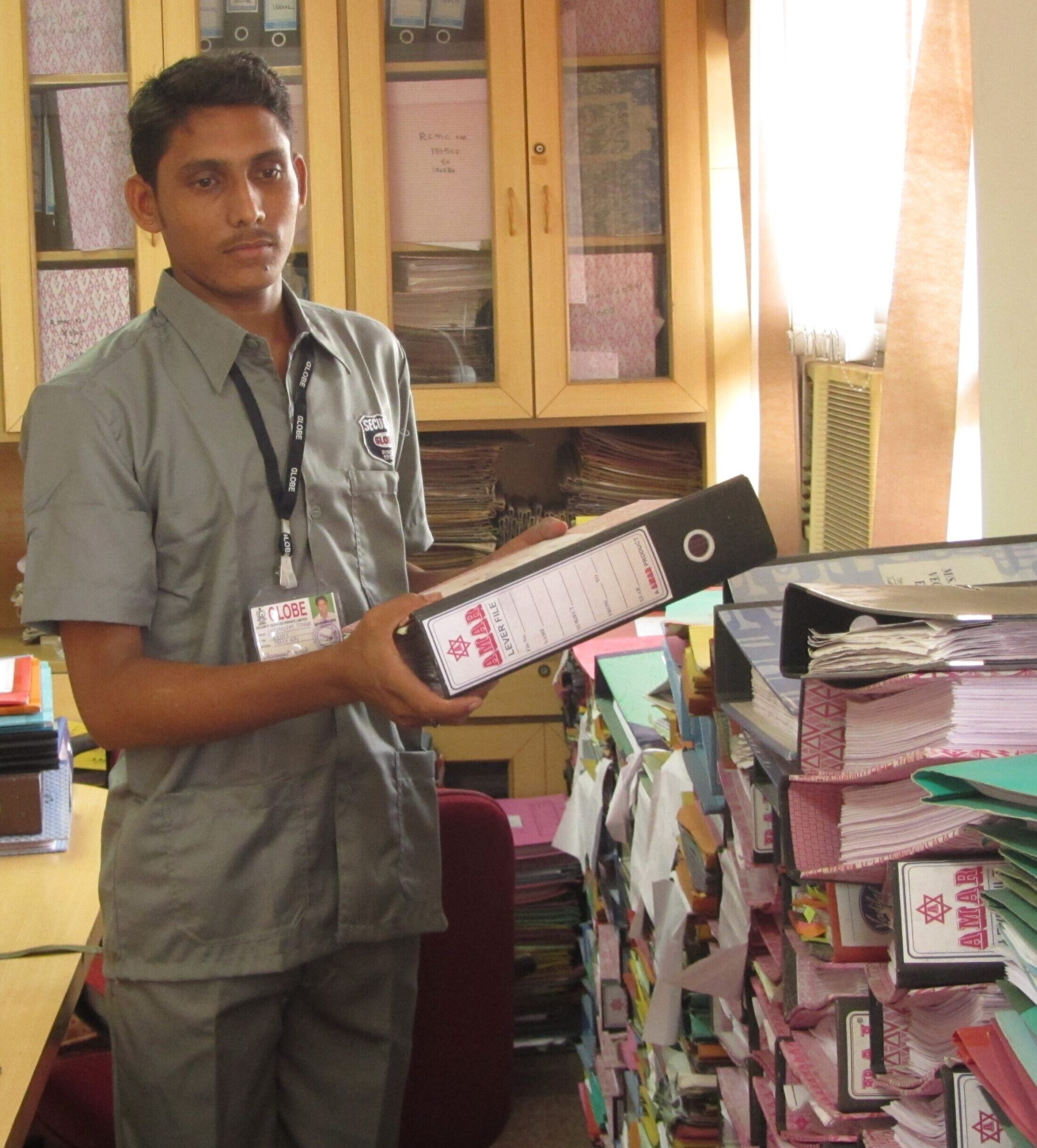 Office Boy handling files
